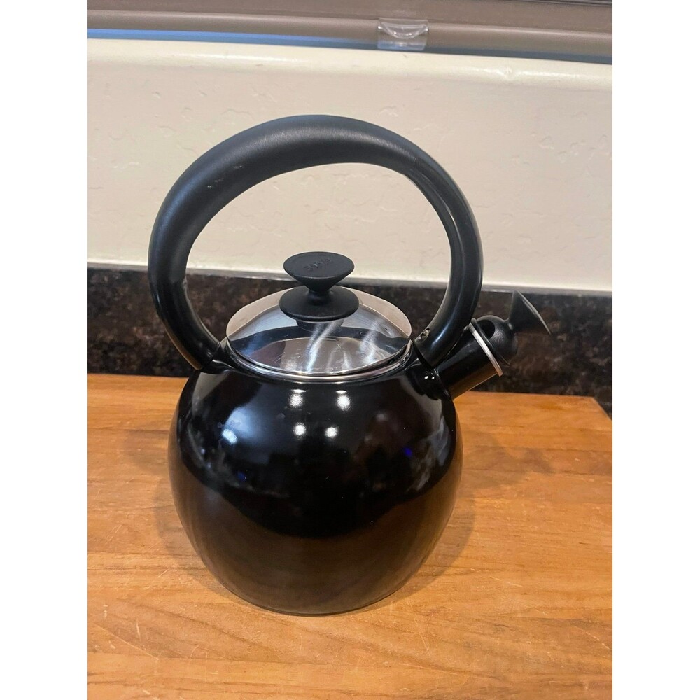 Copco black enameled tea pot with whistler